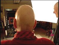 Rear view of Libby's head as she faces Elsa's camera.